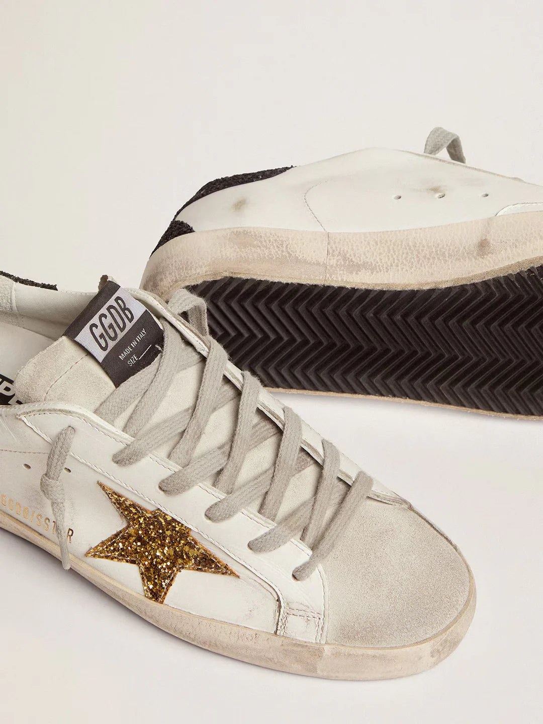 Super-Star femme en cuir nappa avec étoile à paillettes dorées et contrefort à paillettes noires